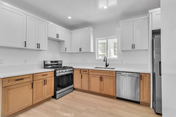 Interior, Kitchen, Recessed Lighting, Stainless Steel Appliances, Wood Texture Flooring