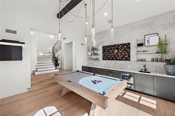 Billiard Table, Game Room, Interior, Pendant Lights, Recessed Lighting, Stone Walls, Wood Texture Flooring