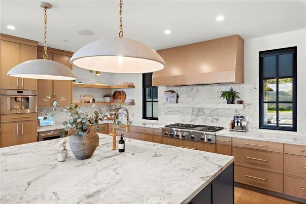 Interior, Kitchen, Marble Walls, Pendant Lights, Recessed Lighting, Stainless Steel Appliances, Wood Texture Flooring