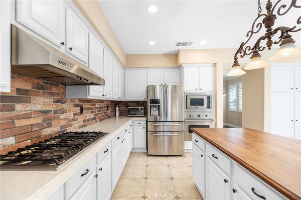Interior, Kitchen, Recessed Lighting, Stainless Steel Appliances, Stone Walls