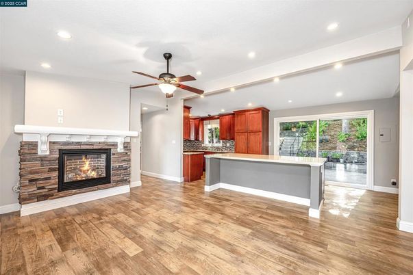 Fireplace, Interior, Kitchen, Recessed Lighting, Wood Texture Flooring