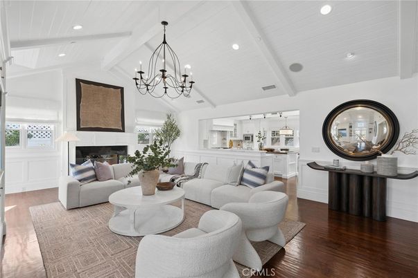Chandelier, Fireplace, Interior, Kitchen, Living room, Recessed Lighting, Wood Texture Flooring