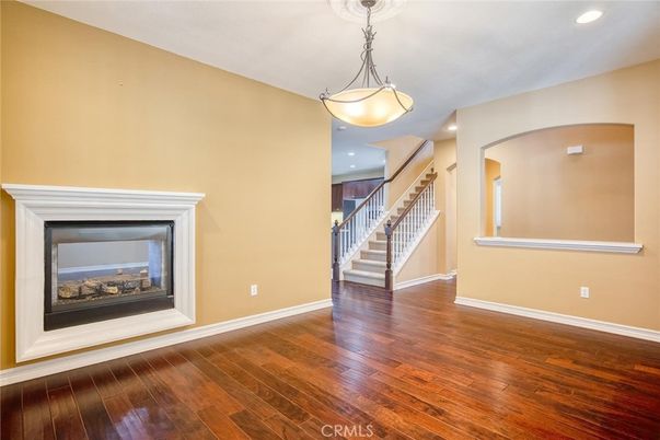 Fireplace, Interior, Pendant Lights, Recessed Lighting, Wood Texture Flooring
