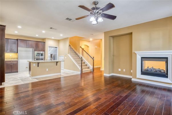 Empty room, Fireplace, Interior, Kitchen, Recessed Lighting, Wood Texture Flooring