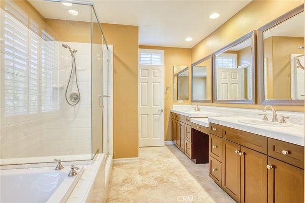 Bathroom, Dual Sink Vanities, Glass Shower, Interior, Recessed Lighting, Tile Countertops