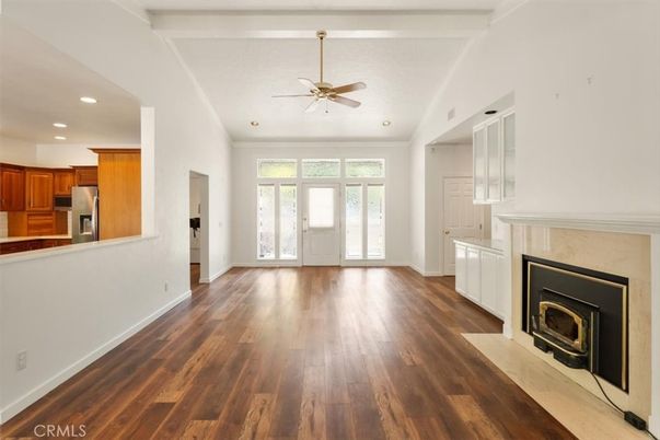 Empty room, Fireplace, Interior, Kitchen, Recessed Lighting, Wood Texture Flooring
