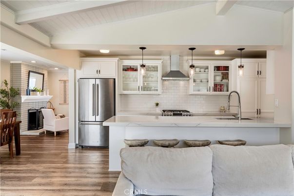 Fireplace, Interior, Kitchen, Pendant Lights, Recessed Lighting, Stainless Steel Appliances, Wood Texture Flooring