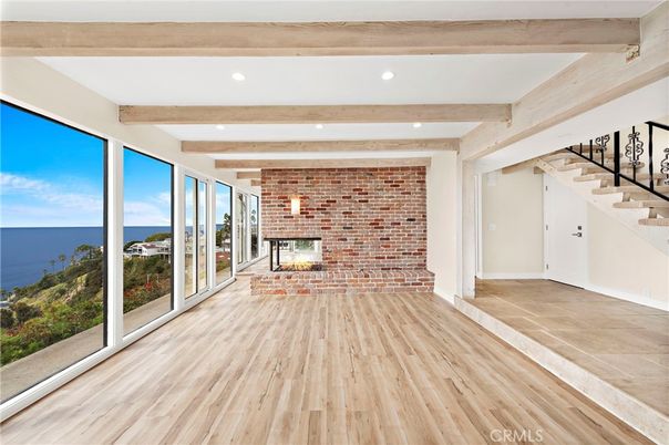 Fireplace, Interior, Recessed Lighting, Stone Walls, Water, Wooden Beams, Wood Texture Flooring