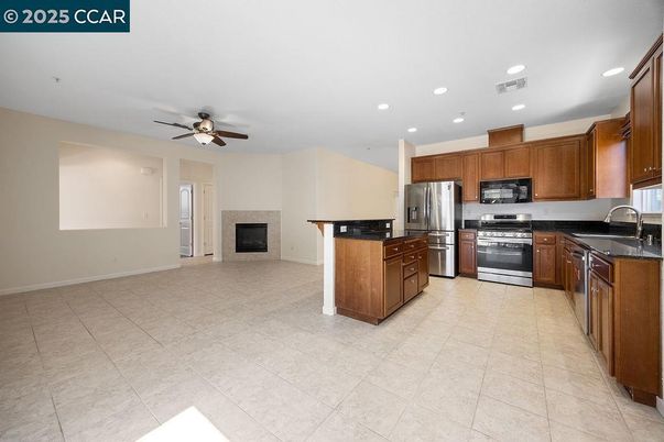 Fireplace, Interior, Kitchen, Recessed Lighting, Stainless Steel Appliances