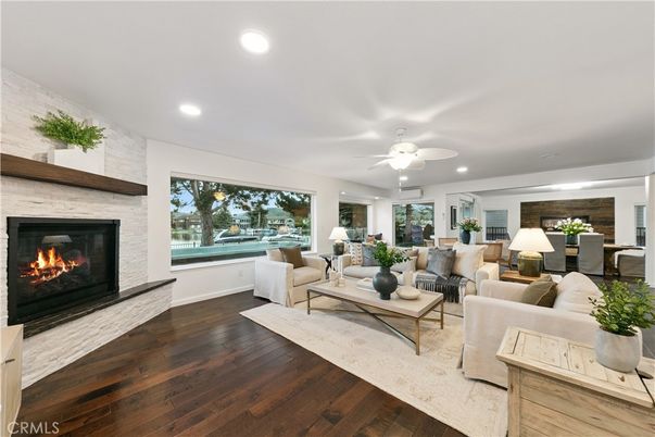 Dining room, Fireplace, Interior, Living room, Recessed Lighting, Wood Texture Flooring