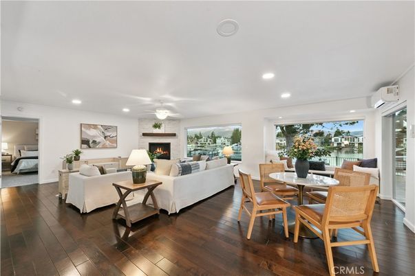 Dining room, Fireplace, Interior, Living room, Recessed Lighting, Wood Texture Flooring