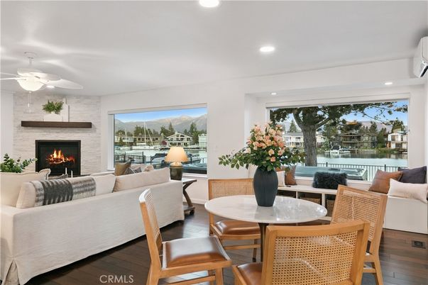 Fireplace, Interior, Living room, Recessed Lighting, Stone Walls, Wood Texture Flooring