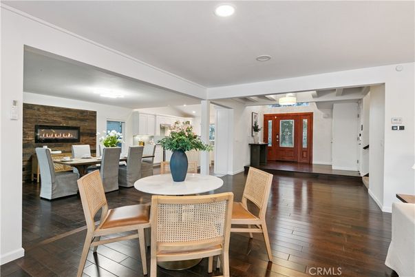 Dining room, Fireplace, Interior, Recessed Lighting, Stone Walls, Wood Texture Flooring