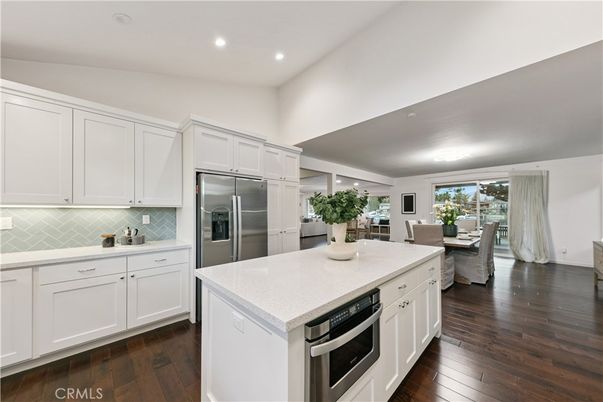 Dining room, Interior, Kitchen, Recessed Lighting, Stainless Steel Appliances, Wood Texture Flooring