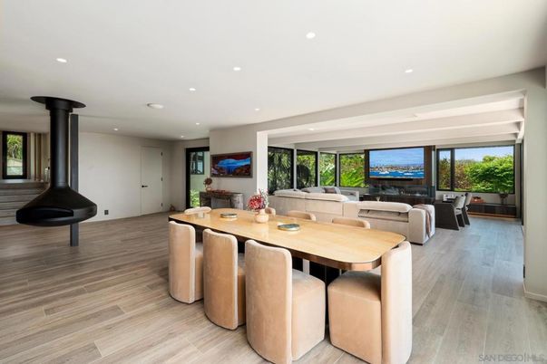 Dining room, Fireplace, Interior, Living room, Recessed Lighting, Water, Wood Texture Flooring