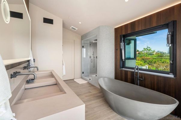 Bathroom, Free Standing Baths, Glass Shower, Interior, Recessed Lighting, Wood Texture Flooring, Wooden Walls