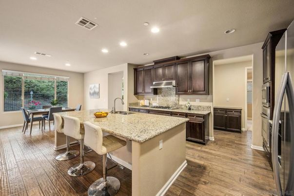 Dining room, Interior, Kitchen, Recessed Lighting, Stainless Steel Appliances, Wood Texture Flooring