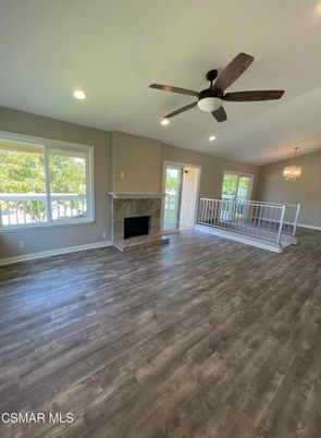 Chandelier, Dining room, Empty room, Fireplace, Interior, Recessed Lighting, Wood Texture Flooring