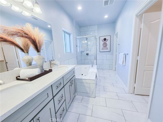 Bathroom, Dual Sink Vanities, Glass Shower, Interior, Marble, Recessed Lighting