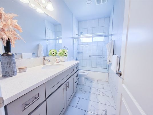 Bathroom, Dual Sink Vanities, Glass Shower, Interior, Marble, Recessed Lighting