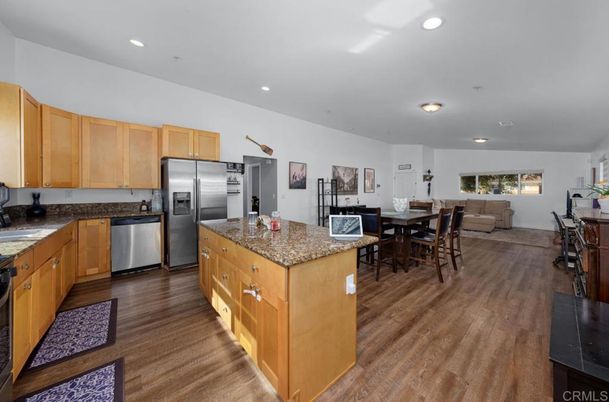 Dining room, Interior, Kitchen, Recessed Lighting, Stainless Steel Appliances, Wood Texture Flooring