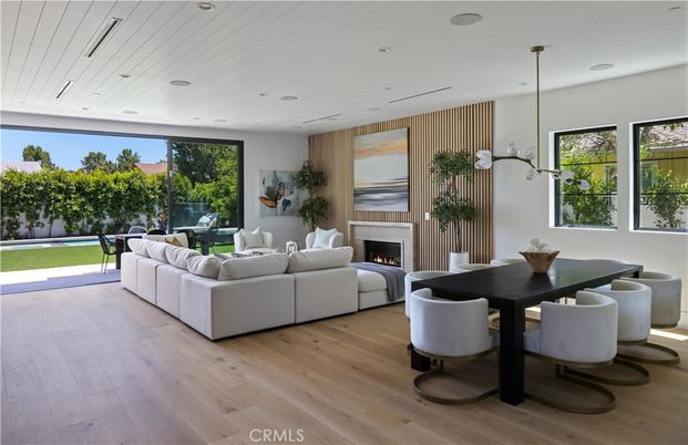 Dining room, Fireplace, Interior, Living room, Pendant Lights, Recessed Lighting, Wood Texture Flooring