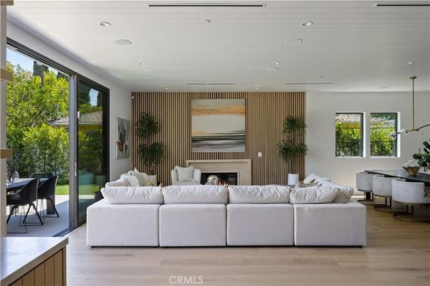 Dining room, Fireplace, Interior, Living room, Pendant Lights, Recessed Lighting, Wood Texture Flooring