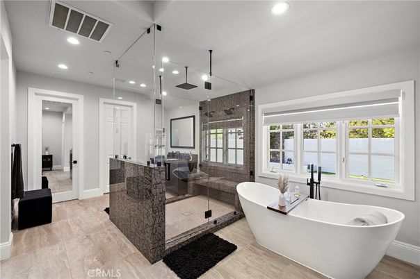 Bathroom, Dual Sink Vanities, Free Standing Baths, Glass Shower, Interior, Pendant Lights, Recessed Lighting, Water
