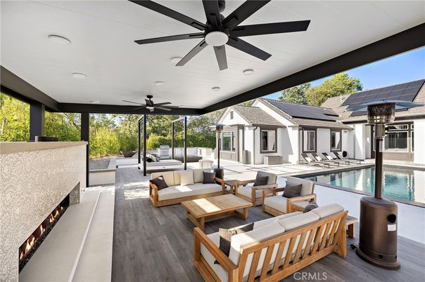 Exterior, Fireplace, Pool, Recessed Lighting, Solar Panels, Wood Texture Flooring