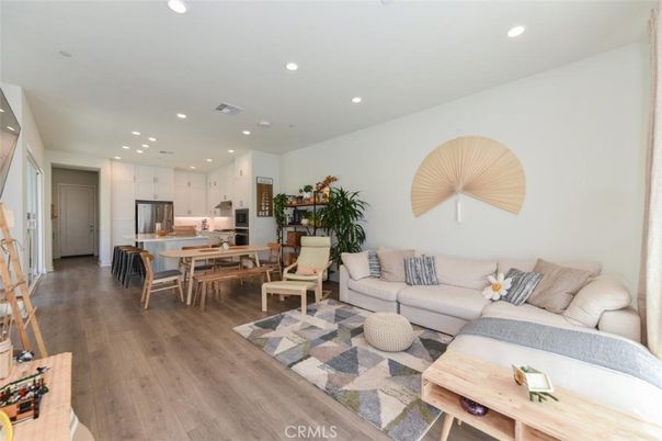Dining room, Interior, Kitchen, Living room, Recessed Lighting, Stainless Steel Appliances, Wood Texture Flooring