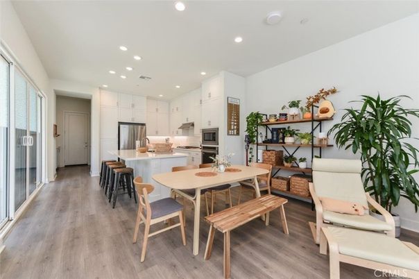 Dining room, Interior, Kitchen, Recessed Lighting, Stainless Steel Appliances, Wood Texture Flooring