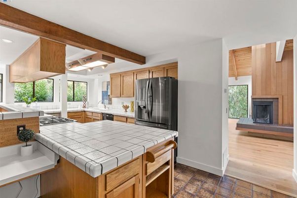 Fireplace, Interior, Kitchen, Recessed Lighting, Tile Countertops, Wooden Beams