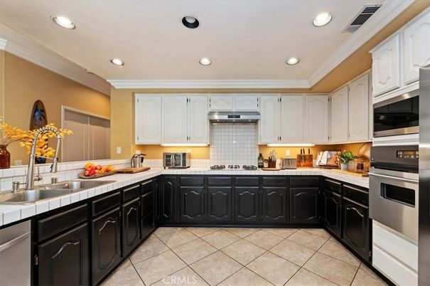 Interior, Kitchen, Recessed Lighting, Stainless Steel Appliances, Tile Countertops