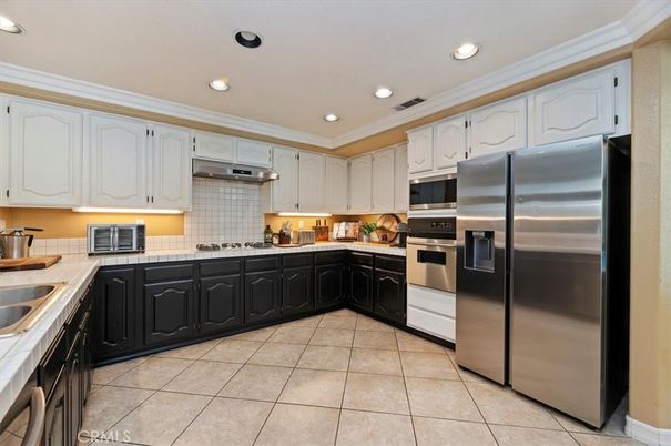 Interior, Kitchen, Recessed Lighting, Stainless Steel Appliances, Tile Countertops