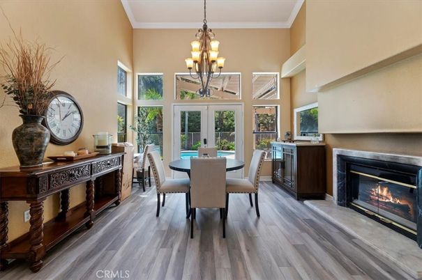 Chandelier, Dining room, Fireplace, Interior, Wood Texture Flooring
