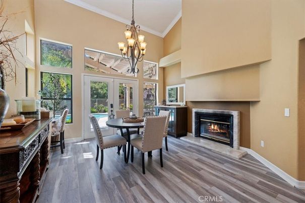 Chandelier, Dining room, Fireplace, Interior, Wood Texture Flooring