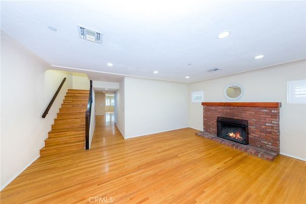 Empty room, Fireplace, Interior, Recessed Lighting, Wood Texture Flooring