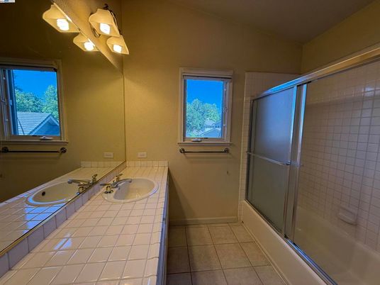 Bathroom, Dual Sink Vanities, Glass Shower, Interior, Tile Countertops