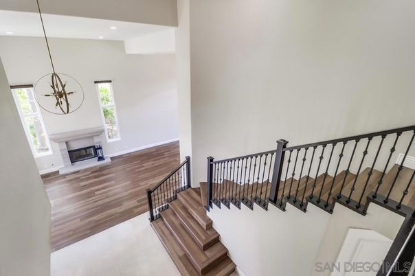 Fireplace, Interior, Pendant Lights, Recessed Lighting, Wood Texture Flooring