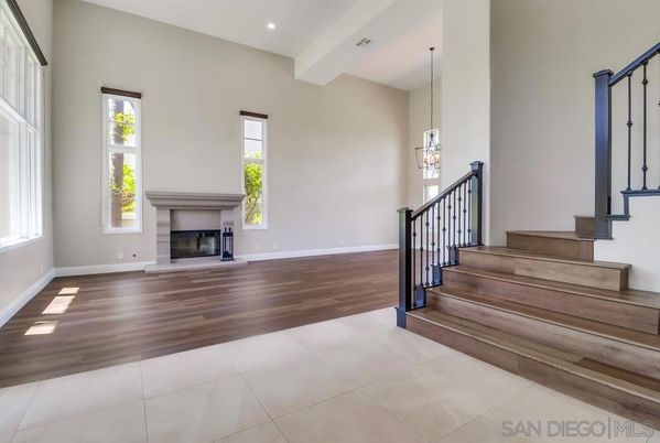Empty room, Fireplace, Interior, Pendant Lights, Recessed Lighting, Wood Texture Flooring