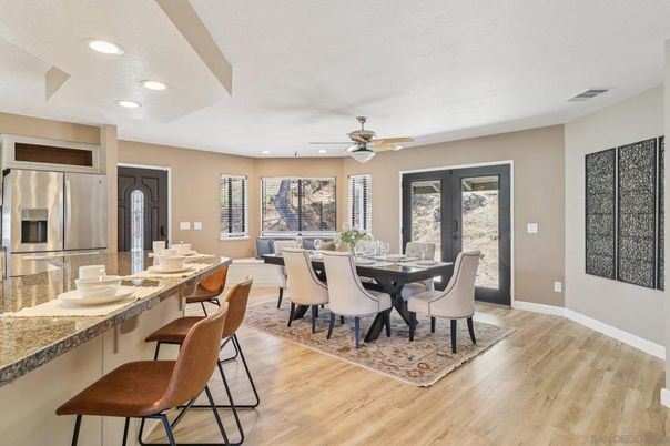 Dining room, Interior, Kitchen, Recessed Lighting, Stainless Steel Appliances, Wood Texture Flooring