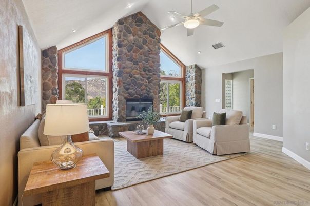 Fireplace, Interior, Living room, Recessed Lighting, Stone Walls, Wood Texture Flooring