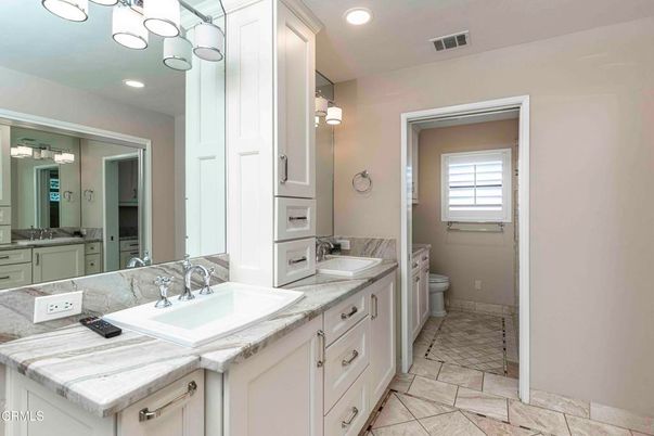 Bathroom, Dual Sink Vanities, Interior, Recessed Lighting, Tile Countertops