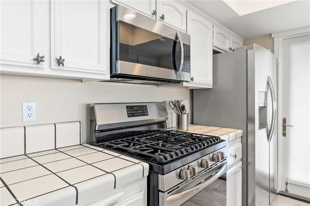 Interior, Kitchen, Stainless Steel Appliances, Tile Countertops