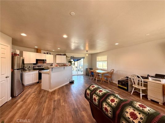 Dining room, Interior, Kitchen, Recessed Lighting, Stainless Steel Appliances, Wood Texture Flooring