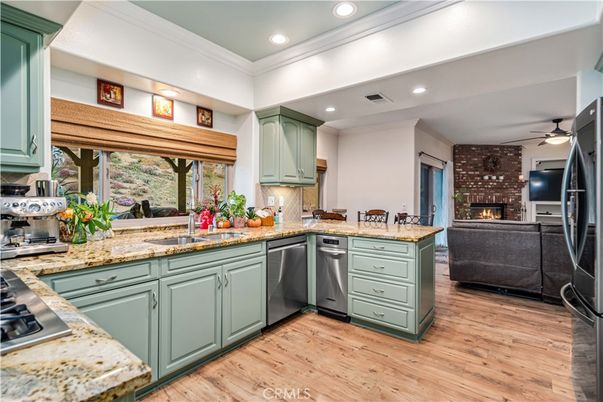 Fireplace, Interior, Kitchen, Recessed Lighting, Stone Walls, Wood Texture Flooring