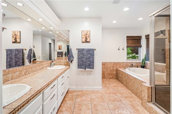 Bathroom, Dual Sink Vanities, Glass Shower, Interior, Recessed Lighting, Tile Countertops