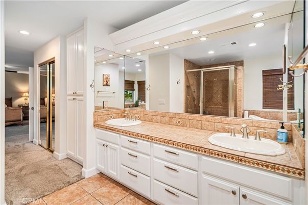 Bathroom, Dual Sink Vanities, Interior, Recessed Lighting, Tile Countertops