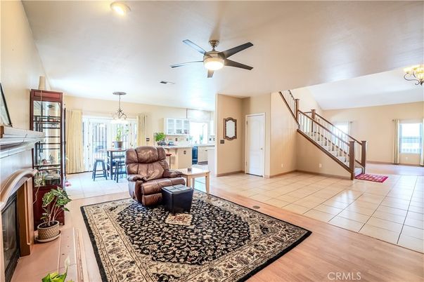Chandelier, Dining room, Fireplace, Interior, Living room, Pendant Lights, Wood Texture Flooring