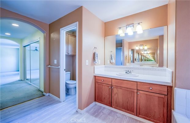 Bathroom, Interior, Recessed Lighting, Tile Countertops, Wood Texture Flooring